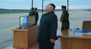 Kim Jung-Un Watches the Hwasong-12 launch. KCNA photo
